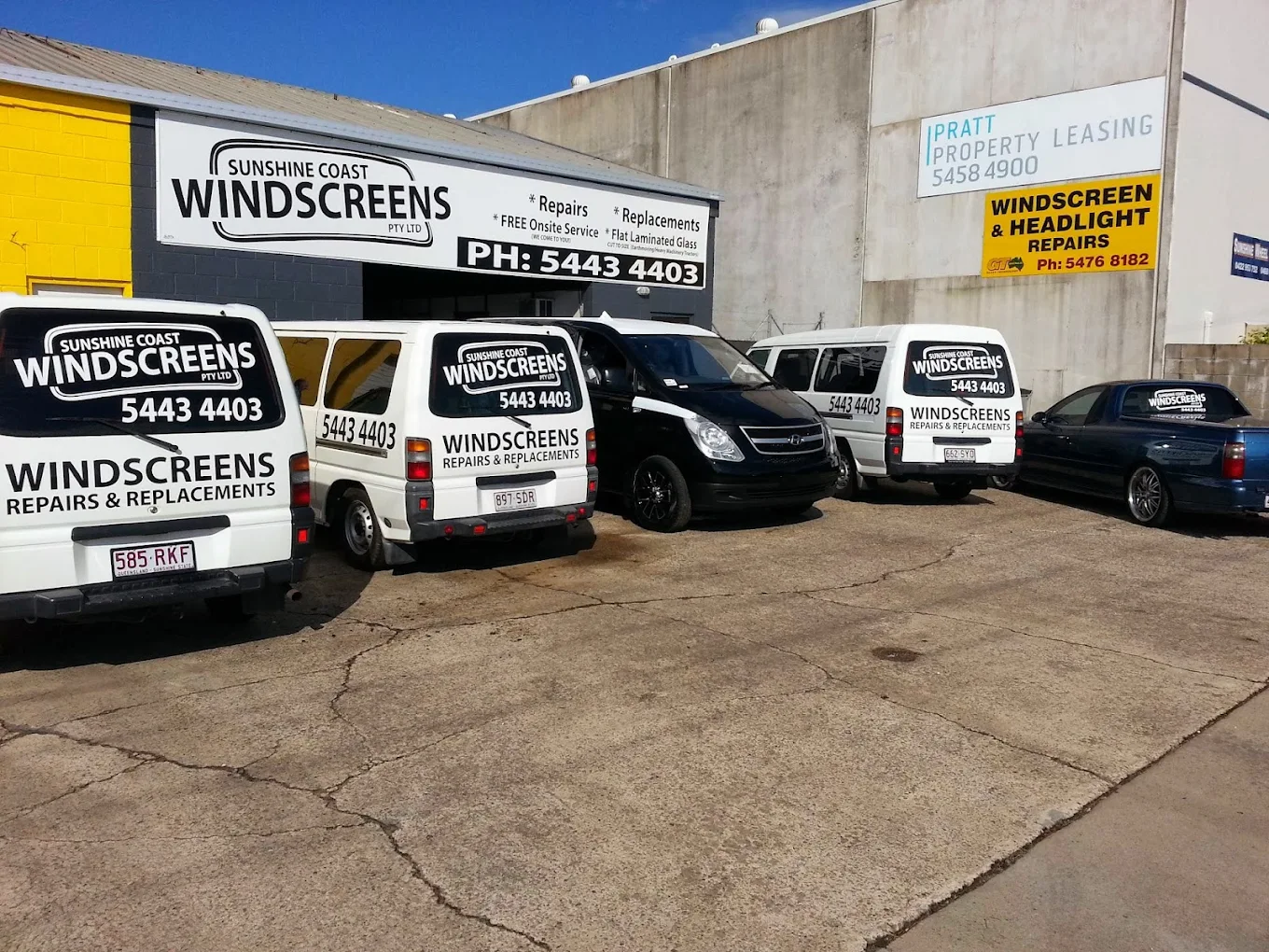 The full Sunshine Coast Windscreens van and ute fleet lined up outside the Buderim shopfront