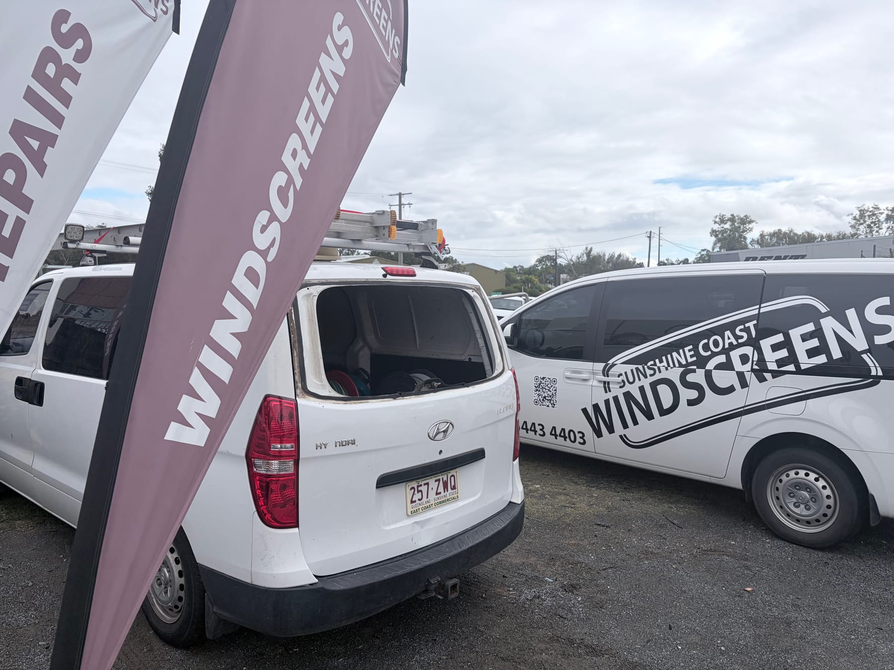 The mobile fleet, flags flying at Buderim — Sunshine Coast Windscreens gallery