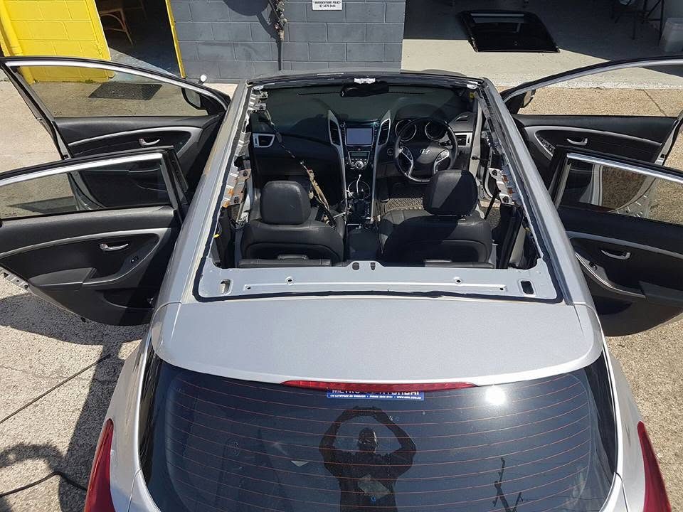 A full windscreen replacement in progress — serving Sippy Downs