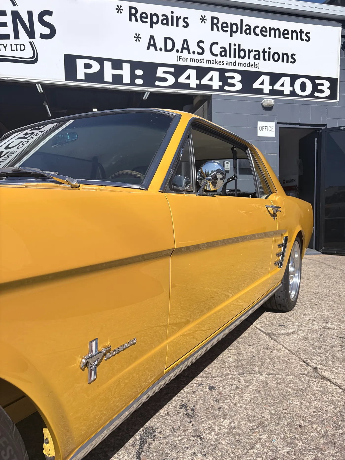 Muscle-car lines under the Buderim signage — Sunshine Coast Windscreens gallery