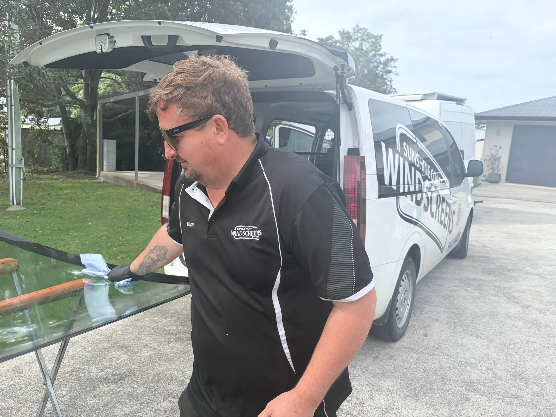 Prepping the glass before it goes in — Sunshine Coast Windscreens gallery